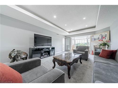 308-990 Golf Links Road, Hamilton, ON - Indoor Photo Showing Living Room With Fireplace