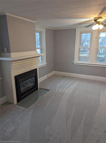 182 Talbot Street N, Simcoe, ON - Indoor Photo Showing Living Room With Fireplace