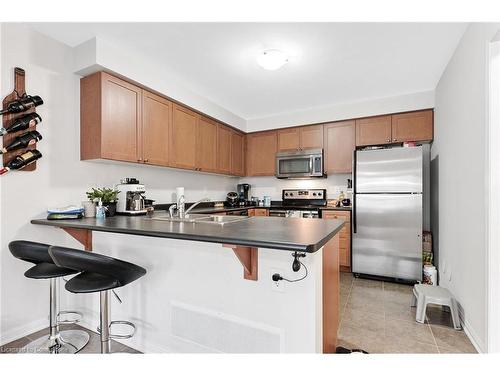 913 Nadalin Heights, Milton, ON - Indoor Photo Showing Kitchen With Double Sink