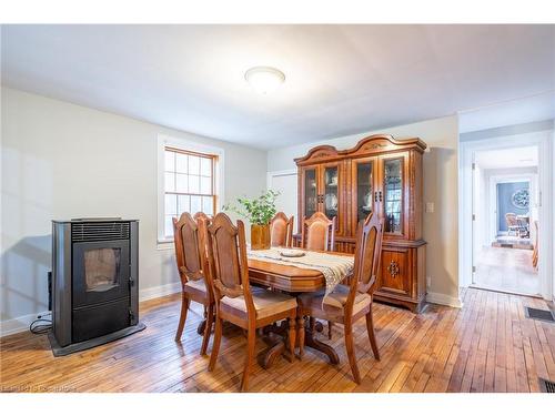 65 7Th Concession Road E, Flamborough, ON - Indoor Photo Showing Dining Room With Fireplace