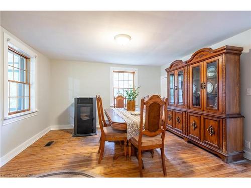 65 7Th Concession Road E, Flamborough, ON - Indoor Photo Showing Dining Room With Fireplace