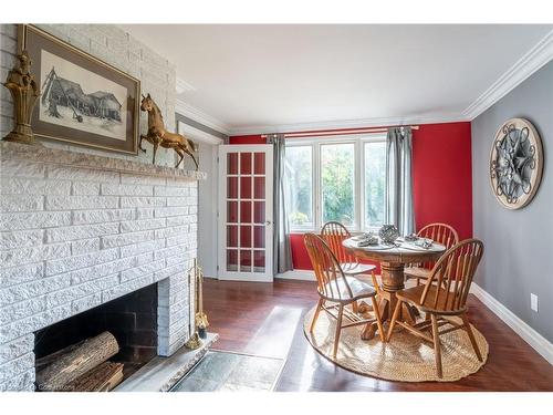 65 7Th Concession Road E, Flamborough, ON - Indoor Photo Showing Dining Room With Fireplace