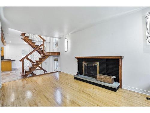 1 Northcliffe Avenue, Dundas, ON - Indoor Photo Showing Living Room With Fireplace