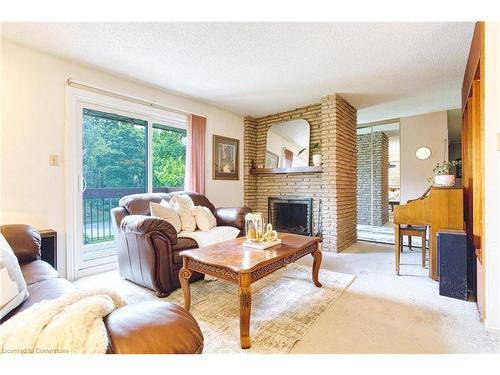 4 Cedar Glen, Grimsby, ON - Indoor Photo Showing Living Room With Fireplace