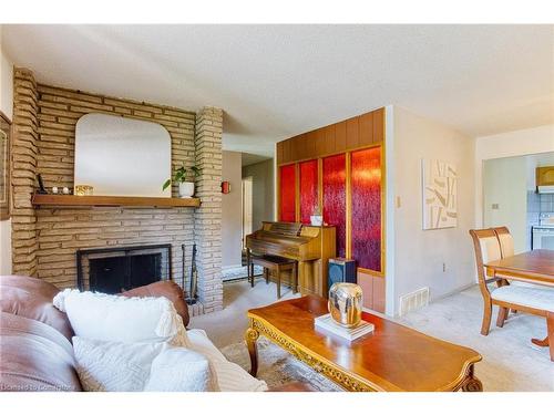 4 Cedar Glen, Grimsby, ON - Indoor Photo Showing Living Room With Fireplace