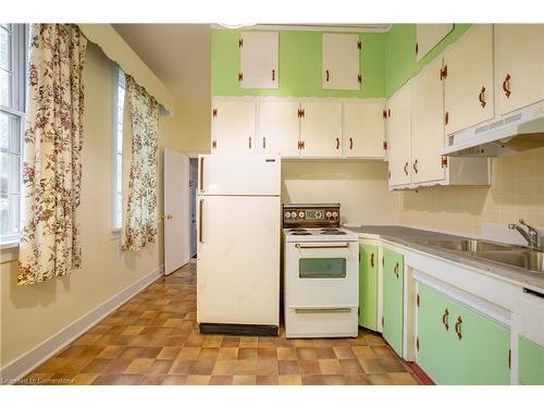 321 Main Street W, Hamilton, ON - Indoor Photo Showing Kitchen With Double Sink