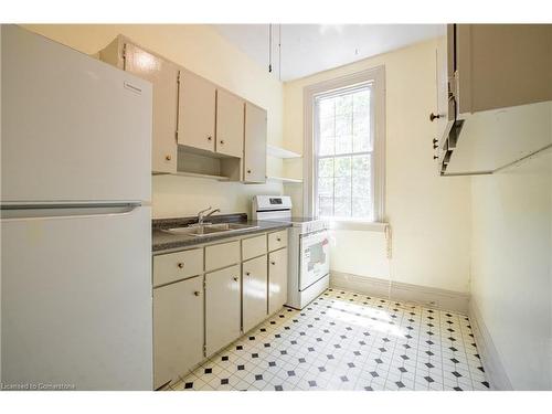 321 Main Street W, Hamilton, ON - Indoor Photo Showing Kitchen With Double Sink