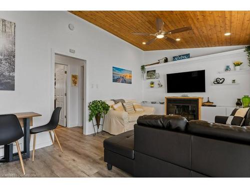 25 Erie Heights Line, Lowbanks, ON - Indoor Photo Showing Living Room With Fireplace