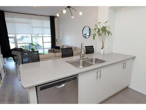 104-10 Concord Place, Grimsby, ON - Indoor Photo Showing Kitchen With Double Sink