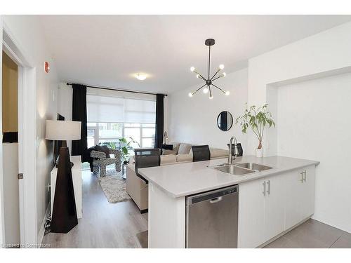 104-10 Concord Place, Grimsby, ON - Indoor Photo Showing Kitchen With Double Sink