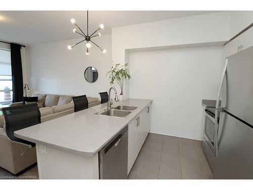 104-10 Concord Place, Grimsby, ON - Indoor Photo Showing Kitchen With Double Sink