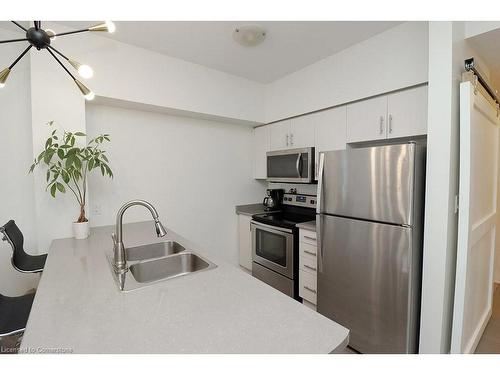 104-10 Concord Place, Grimsby, ON - Indoor Photo Showing Kitchen With Double Sink