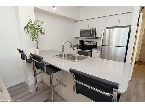 104-10 Concord Place, Grimsby, ON - Indoor Photo Showing Kitchen With Double Sink With Upgraded Kitchen