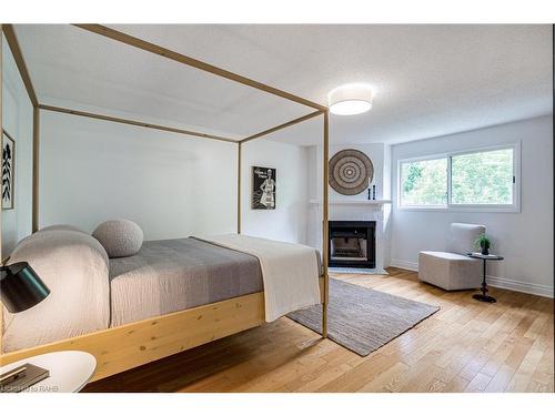 4107 Wheelwright Crescent, Mississauga, ON - Indoor Photo Showing Bedroom With Fireplace