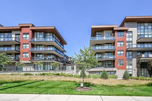 304-1575 Lakeshore Road W, Mississauga, ON - Outdoor With Balcony With Facade