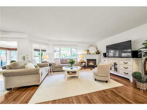 19-375 Book Road, Grimsby, ON - Indoor Photo Showing Living Room With Fireplace