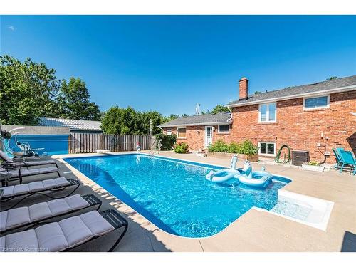 24 Harbinger Drive, Stoney Creek, ON - Outdoor With In Ground Pool With Backyard