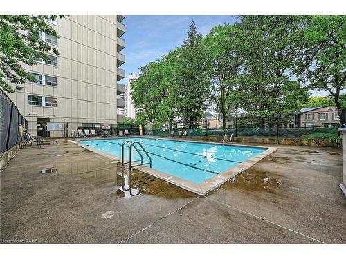 504-1415 Ghent Avenue, Burlington, ON - Outdoor With In Ground Pool