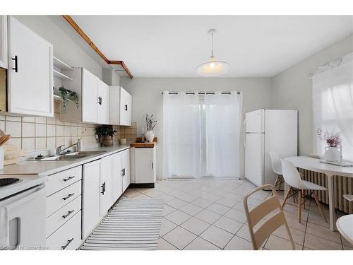 13 Clinton Street, Hamilton, ON - Indoor Photo Showing Kitchen With Double Sink