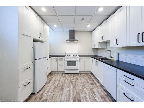 1-344 Main Street W, Hamilton, ON - Indoor Photo Showing Kitchen With Double Sink