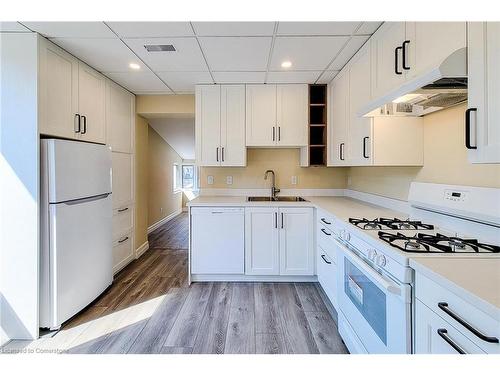 2-344 Main Street W, Hamilton, ON - Indoor Photo Showing Kitchen With Double Sink