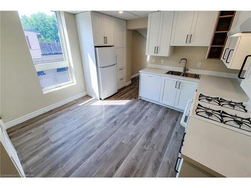 2-344 Main Street W, Hamilton, ON - Indoor Photo Showing Kitchen With Double Sink