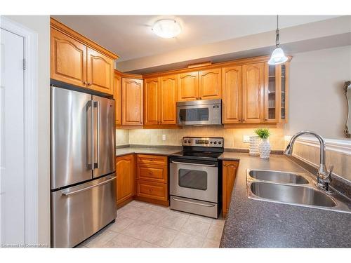 14-2165 Itabashi Way, Burlington, ON - Indoor Photo Showing Kitchen With Double Sink