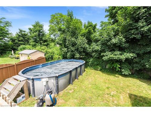 47 Simson Avenue, Simcoe, ON - Outdoor With Above Ground Pool With Backyard