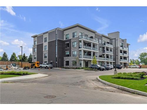 410-120 Spring Valley Crescent, Hamilton, ON - Outdoor With Balcony With Facade