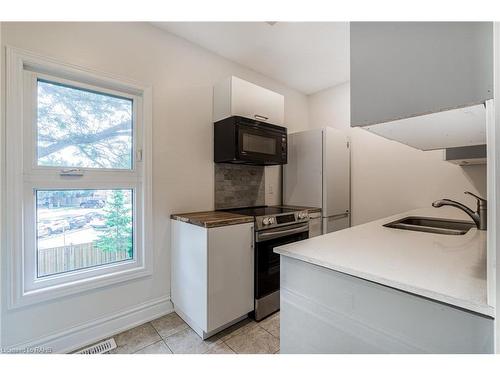 92 Ashley Street, Hamilton, ON - Indoor Photo Showing Kitchen With Double Sink