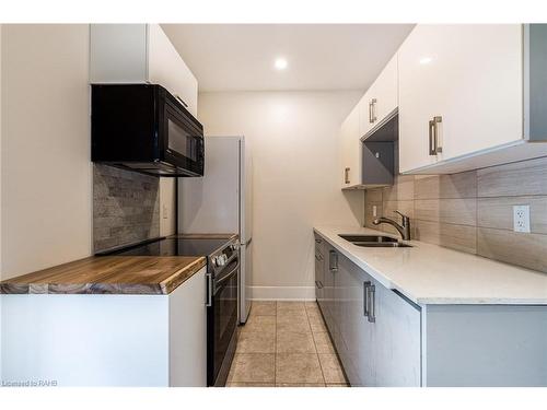 92 Ashley Street, Hamilton, ON - Indoor Photo Showing Kitchen With Double Sink