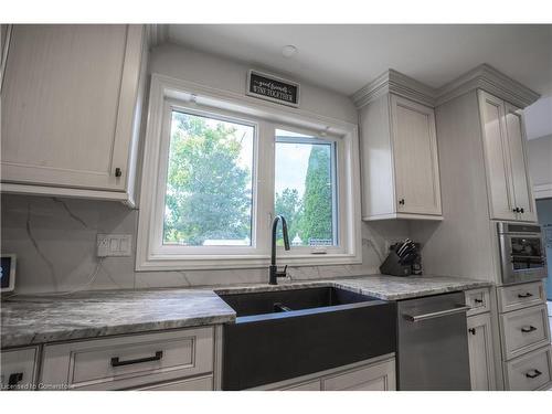 7566 Howard Avenue, Mcgregor, ON - Indoor Photo Showing Kitchen With Double Sink