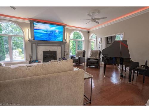 7566 Howard Avenue, Mcgregor, ON - Indoor Photo Showing Living Room With Fireplace