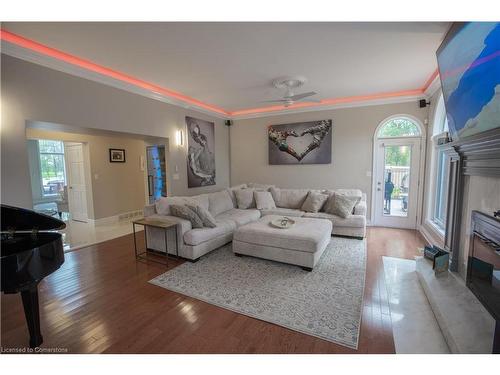 7566 Howard Avenue, Mcgregor, ON - Indoor Photo Showing Living Room With Fireplace