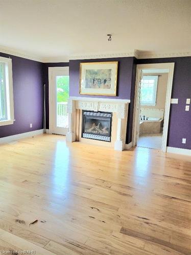 4251 King Street E, Beamsville, ON - Indoor Photo Showing Living Room With Fireplace