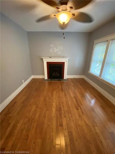 Upper-21 Proctor Boulevard, Hamilton, ON - Indoor Photo Showing Other Room With Fireplace