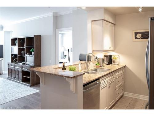 607-40 Old Mill Road, Oakville, ON - Indoor Photo Showing Kitchen With Double Sink With Upgraded Kitchen