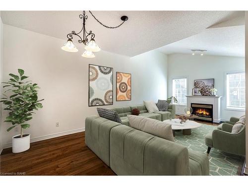 7-100 Beddoe Drive, Hamilton, ON - Indoor Photo Showing Living Room With Fireplace