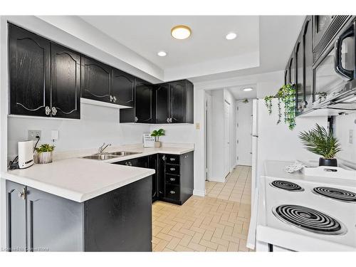 Ph6-2210 Lakeshore Road, Burlington, ON - Indoor Photo Showing Kitchen With Double Sink