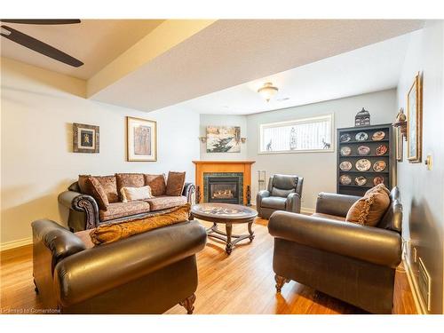 8034 Woodsview Crescent, Niagara Falls, ON - Indoor Photo Showing Living Room With Fireplace