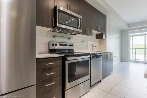 517-320 Plains Road, Burlington, ON - Indoor Photo Showing Kitchen With Upgraded Kitchen