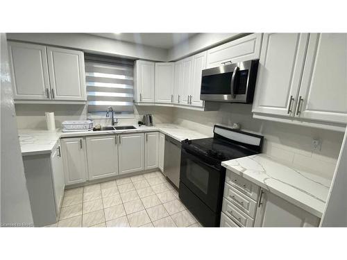 Upper-383 Huntington Ridge Drive, Mississauga, ON - Indoor Photo Showing Kitchen With Double Sink