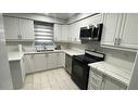 Upper-383 Huntington Ridge Drive, Mississauga, ON  - Indoor Photo Showing Kitchen With Double Sink 