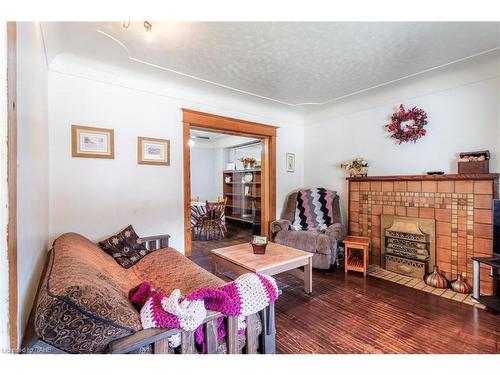 25 Chestnut Avenue, Hamilton, ON - Indoor Photo Showing Living Room With Fireplace