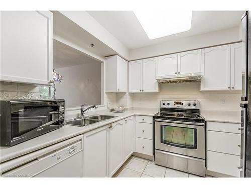 2405-100 Burloak Drive, Burlington, ON - Indoor Photo Showing Kitchen With Double Sink