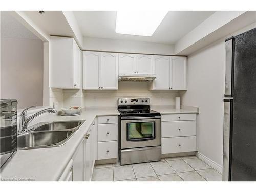 2405-100 Burloak Drive, Burlington, ON - Indoor Photo Showing Kitchen With Double Sink