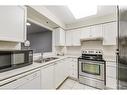 2405-100 Burloak Drive, Burlington, ON  - Indoor Photo Showing Kitchen With Double Sink 