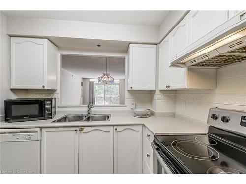 2405-100 Burloak Drive, Burlington, ON - Indoor Photo Showing Kitchen With Double Sink