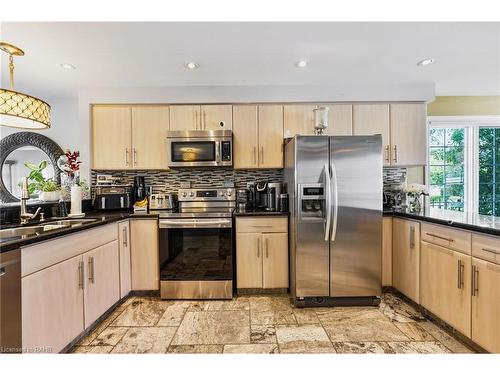 491-493 Dewitt Road, Stoney Creek, ON - Indoor Photo Showing Kitchen With Double Sink