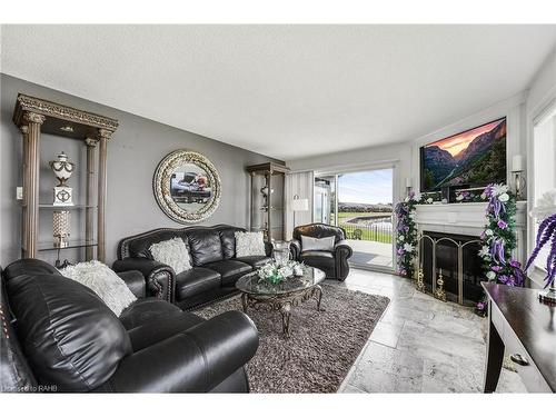 491-493 Dewitt Road, Stoney Creek, ON - Indoor Photo Showing Living Room With Fireplace